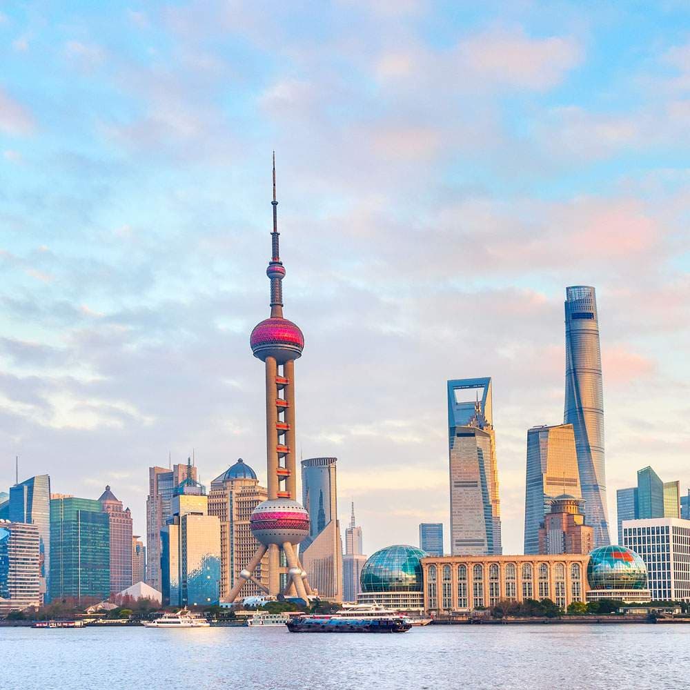 A vibrant city skyline with iconic landmarks and bustling streets, showcasing urban energy and charm